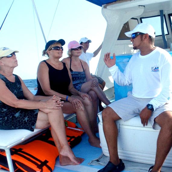 People enjoying a whale shark tour